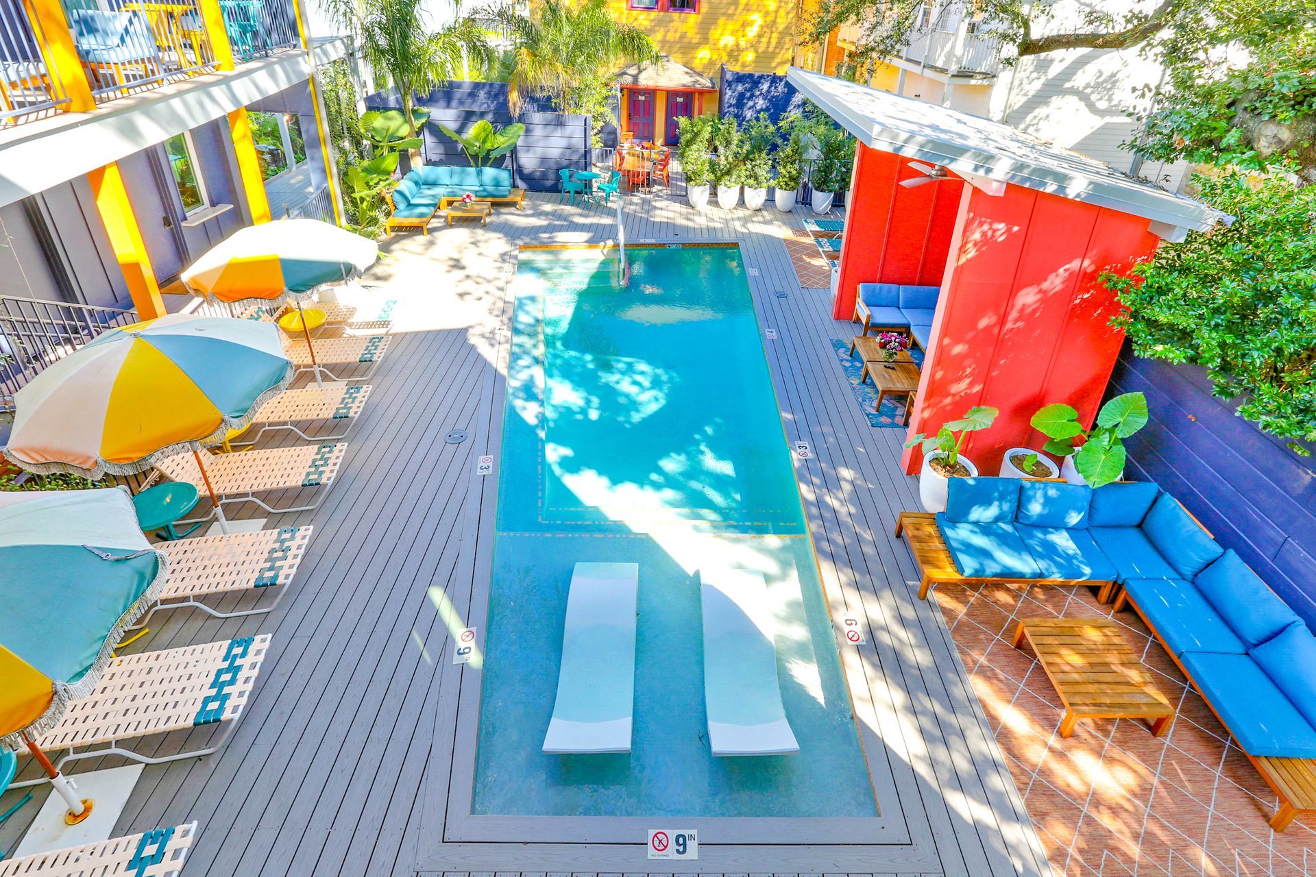 The heated pool and tropical courtyard at The Syd